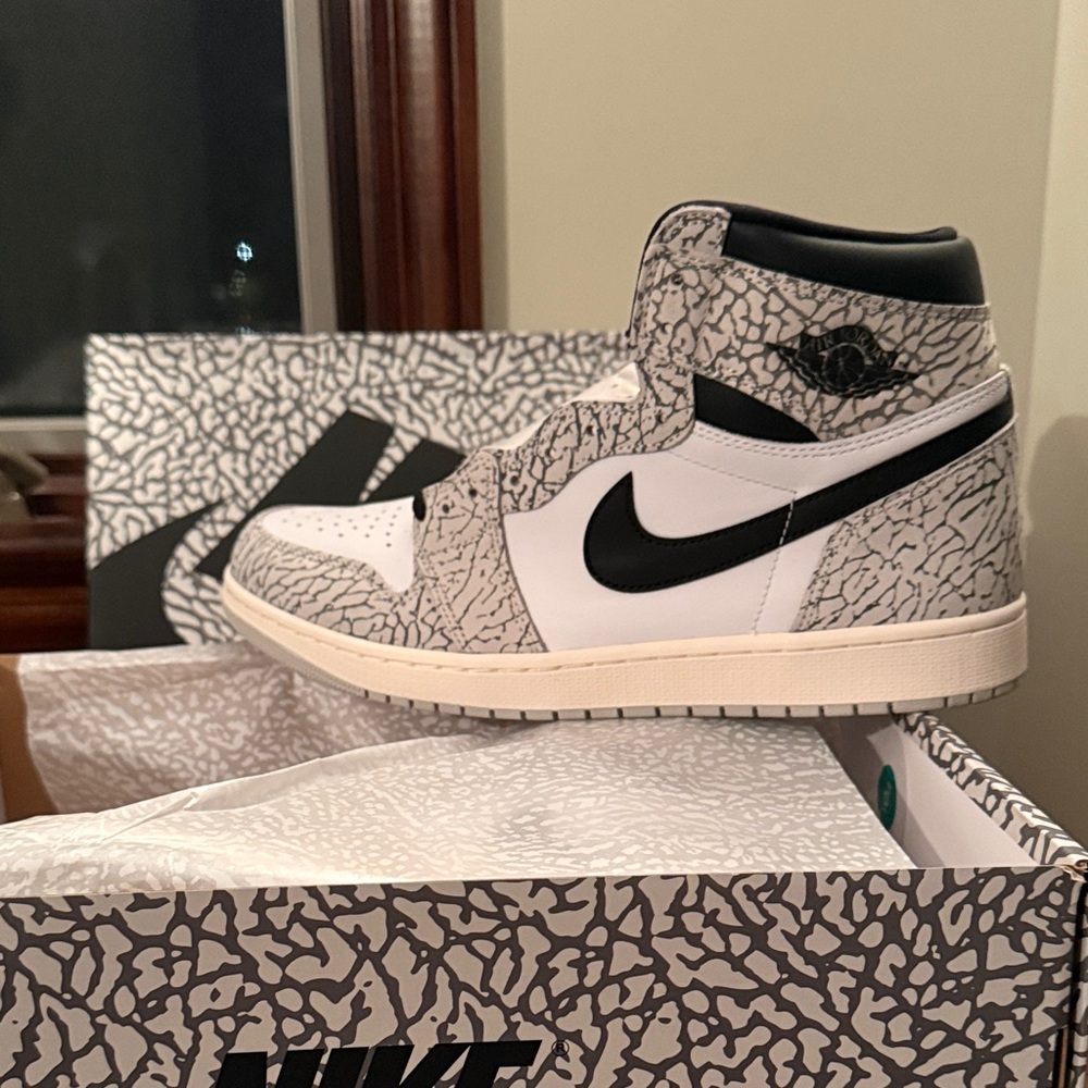 Nike Air Jordan 1 retro High Tops in cement Black, White, and Gray